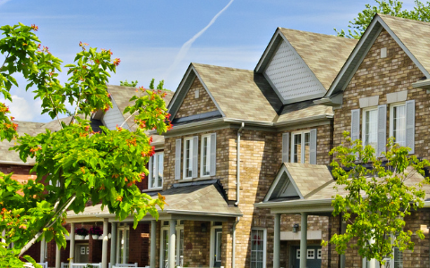 Image of several townhomes in a row.  
